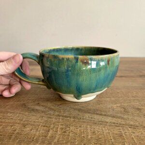 Handmade large ceramic mug with dripping glaze. Signed studio pottery.